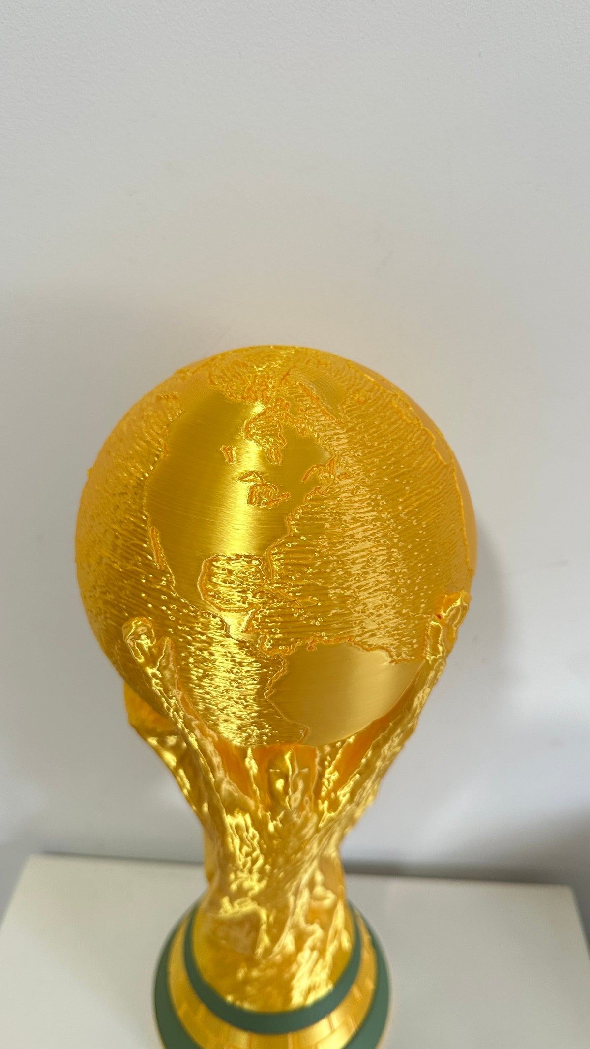 Détail du globe du trophée doré