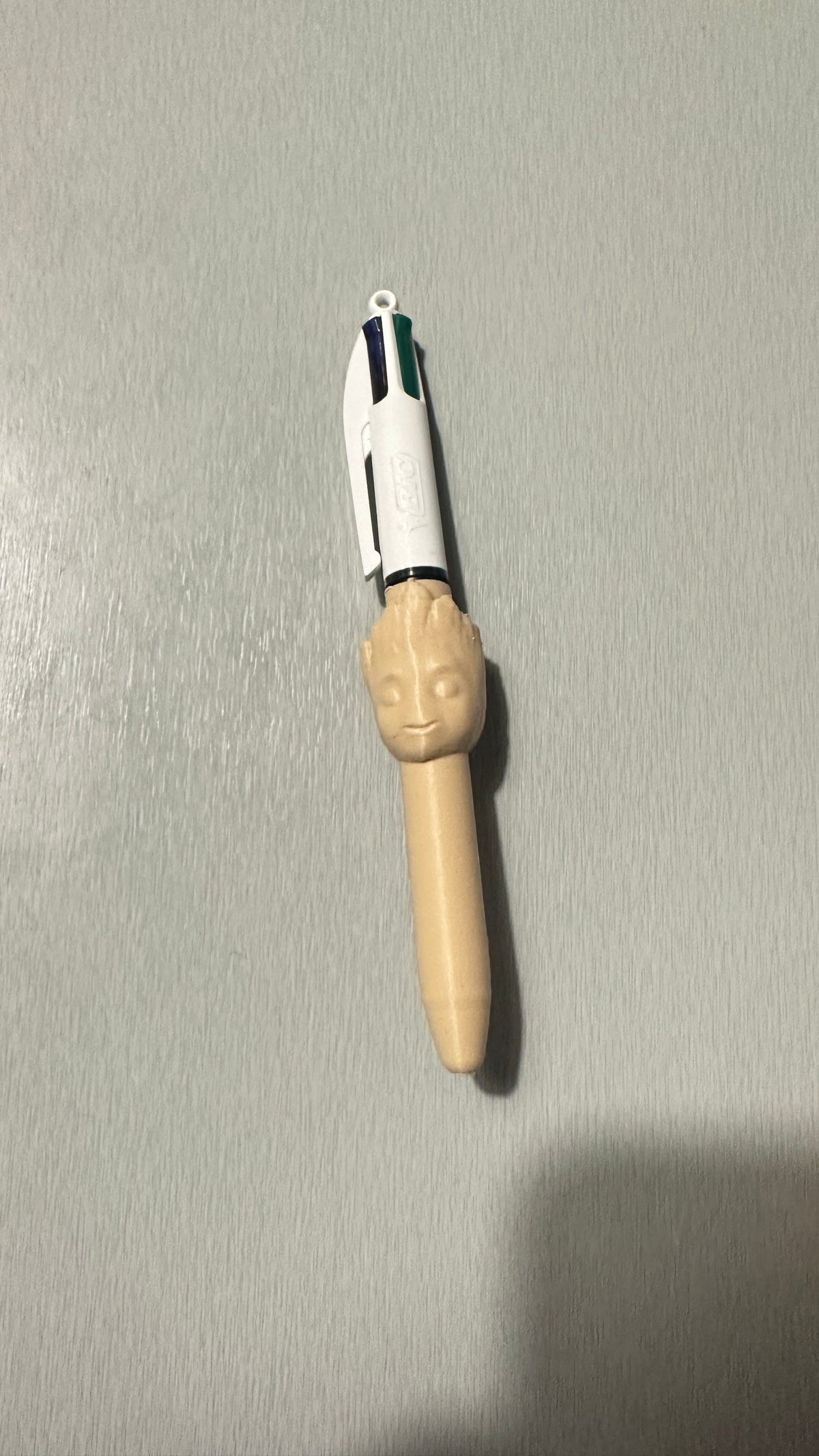 Stylo 4 couleurs avec figurine beige