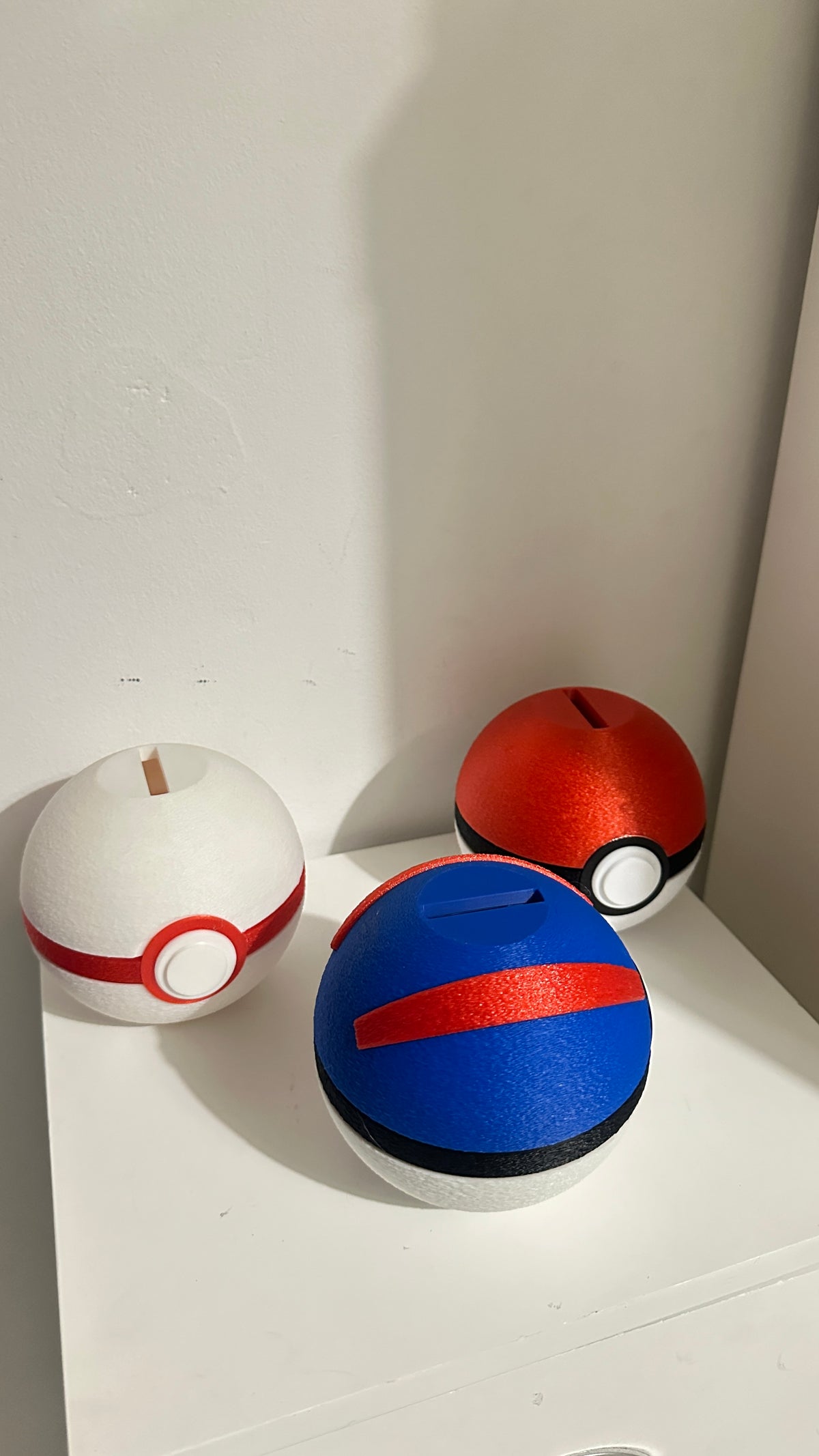 Tirelires boules de plusieurs modèles