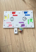 Plateau de jeu Tac Tik blanc à cases colorées vu du dessus